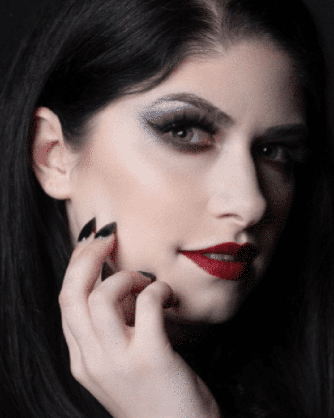 Curst Kosmetics Matte Lip Potion - Reign on a model with black hair and dark makeup part of the blood and glamour blog post.