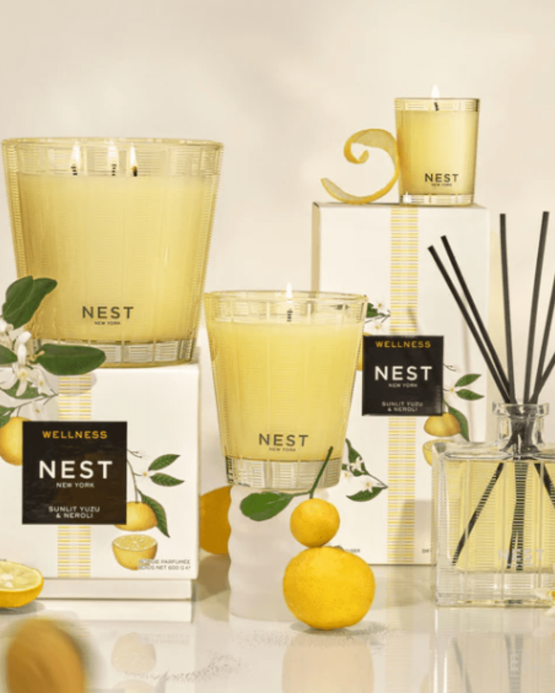 Nest Sunlit Yuzu & Neroli Candle part of a beauty routine.