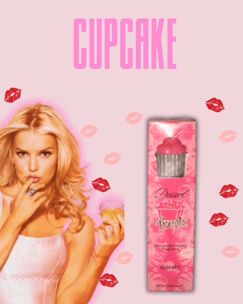 Jessica Simpson posing playfully against a pink background with colorful lipstick kiss marks in various shades of pink, from hot pink to baby pink. She's wearing a silky pink tank top, holding a cupcake with pink frosting, pretending to taste it with her finger. Next to her is a light pink perfume box decorated with kiss marks, with a peekaboo window showing the perfume bottle inside. The top of the fragrance is shaped like a pink cupcake, similar to the one she's holding. The word "Cupcake" appears at the top of the image.