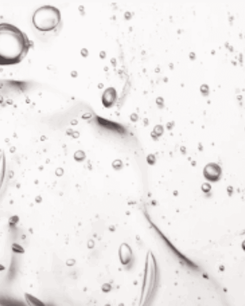 Clear liquid texture representing azelaic acid featured in the Algenist Liquid Skin Resurfacing 2% BHA Toner.