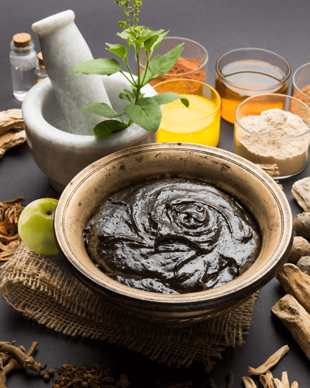 Indian Ayurvedic dietary supplement called Chyawanprash / chyavanaprasha is a cooked mixture of sugar, honey, ghee, Indian Gooseberry (amla), jam, sesame oil, berries, herbs and various spices. Ingredients that may be found in ayurvedic skincare.
