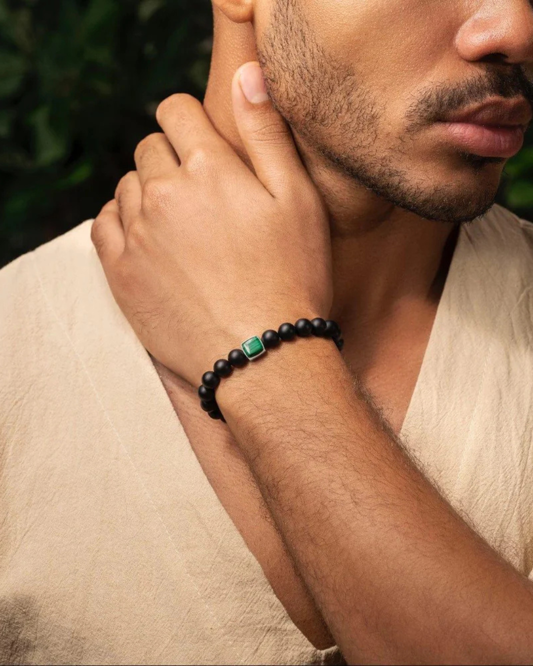 Abundant Positivity Onyx Malachite Bracelet worn on wrist, styled for intentional energy rituals and home cleansing practices