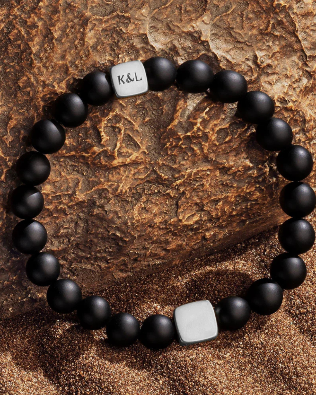 Abundant Positivity Onyx Malachite Bracelet by Karma and Luck, featuring matte black beads and green malachite accents for positive energy