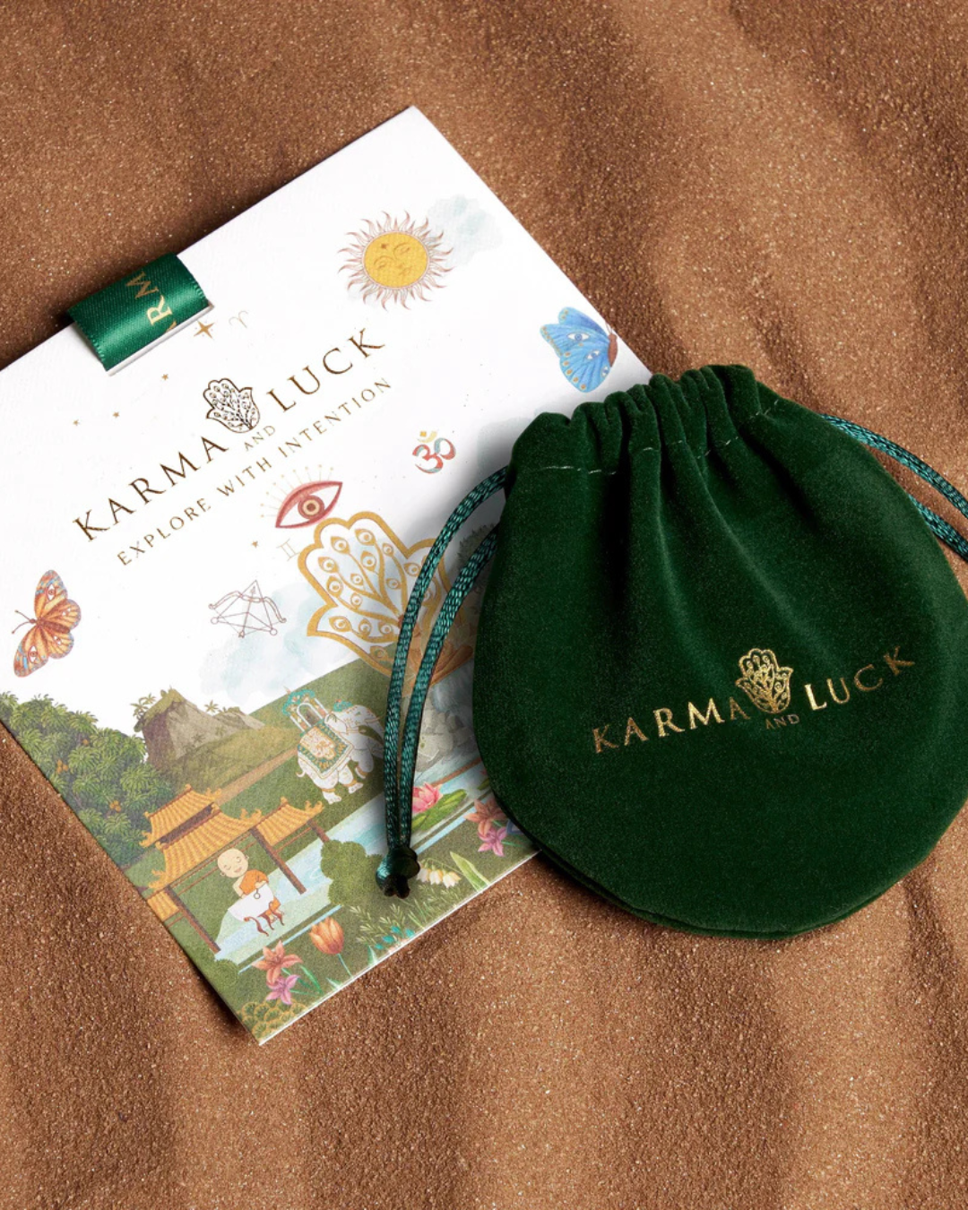 Karma and Luck Abundant Positivity Bracelet shown with packaging and intention card to invite positivity into your home