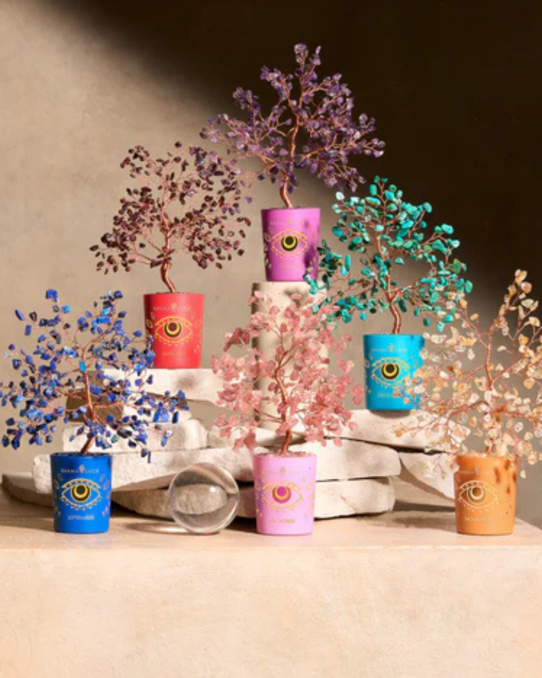 Karma & Luck Tree of Life collection display featuring gemstone Feng Shui trees for inviting positivity into your home