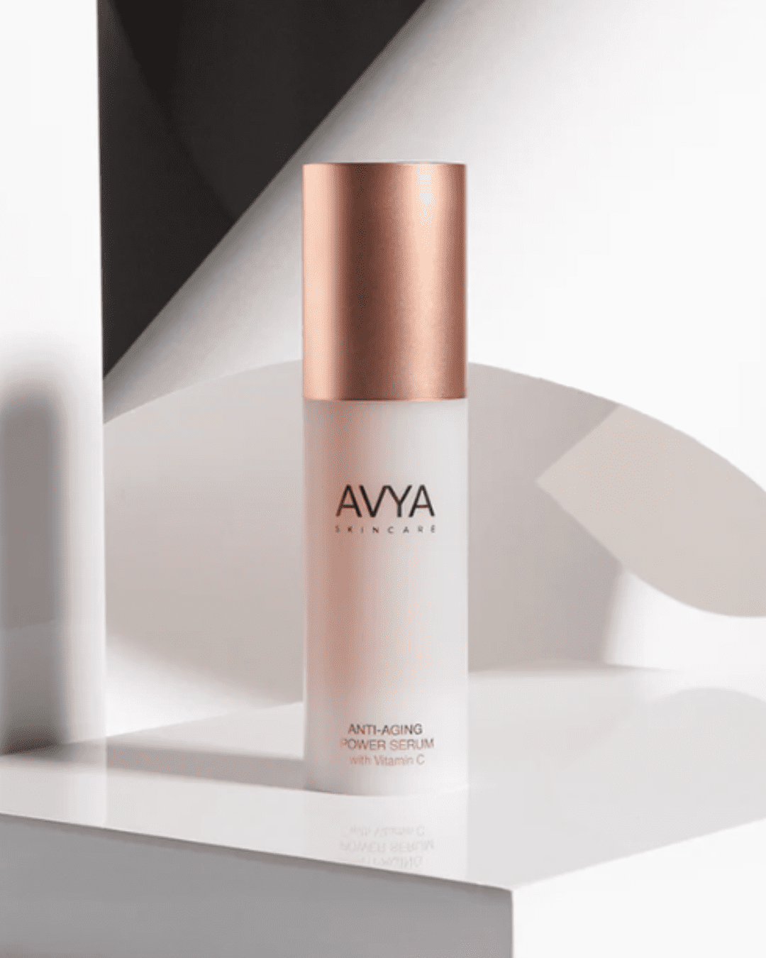 AVYA Advanced Ayurvedic Skincare Anti-Aging Power Serum – The Energy Boost on a white surface and white background with shadows. A product that is Ayurvedic skincare.