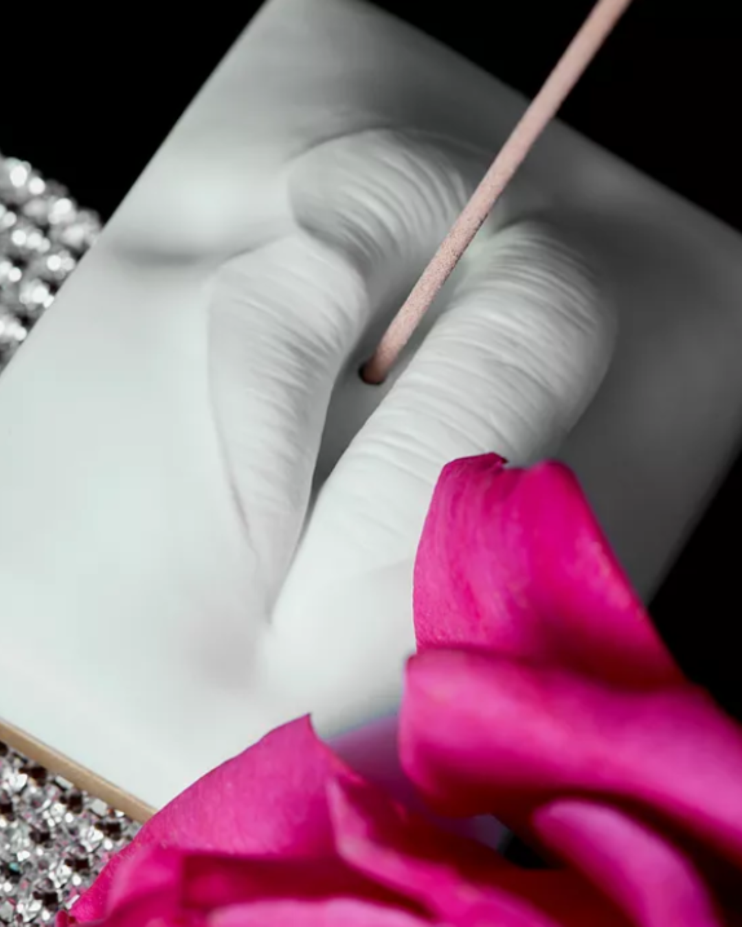 L’Objet Smoking Lips incense holder in white porcelain with gold-toned brass, styled to invite positivity into your home