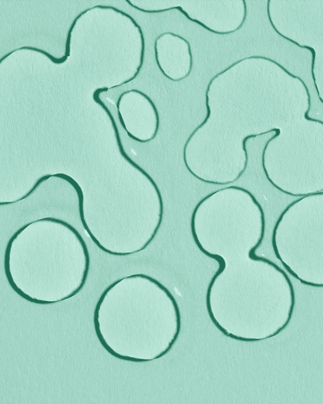 Algenist’s Genius Liquid Skin Resurfacing 2% BHA Toner product on a teal surface.