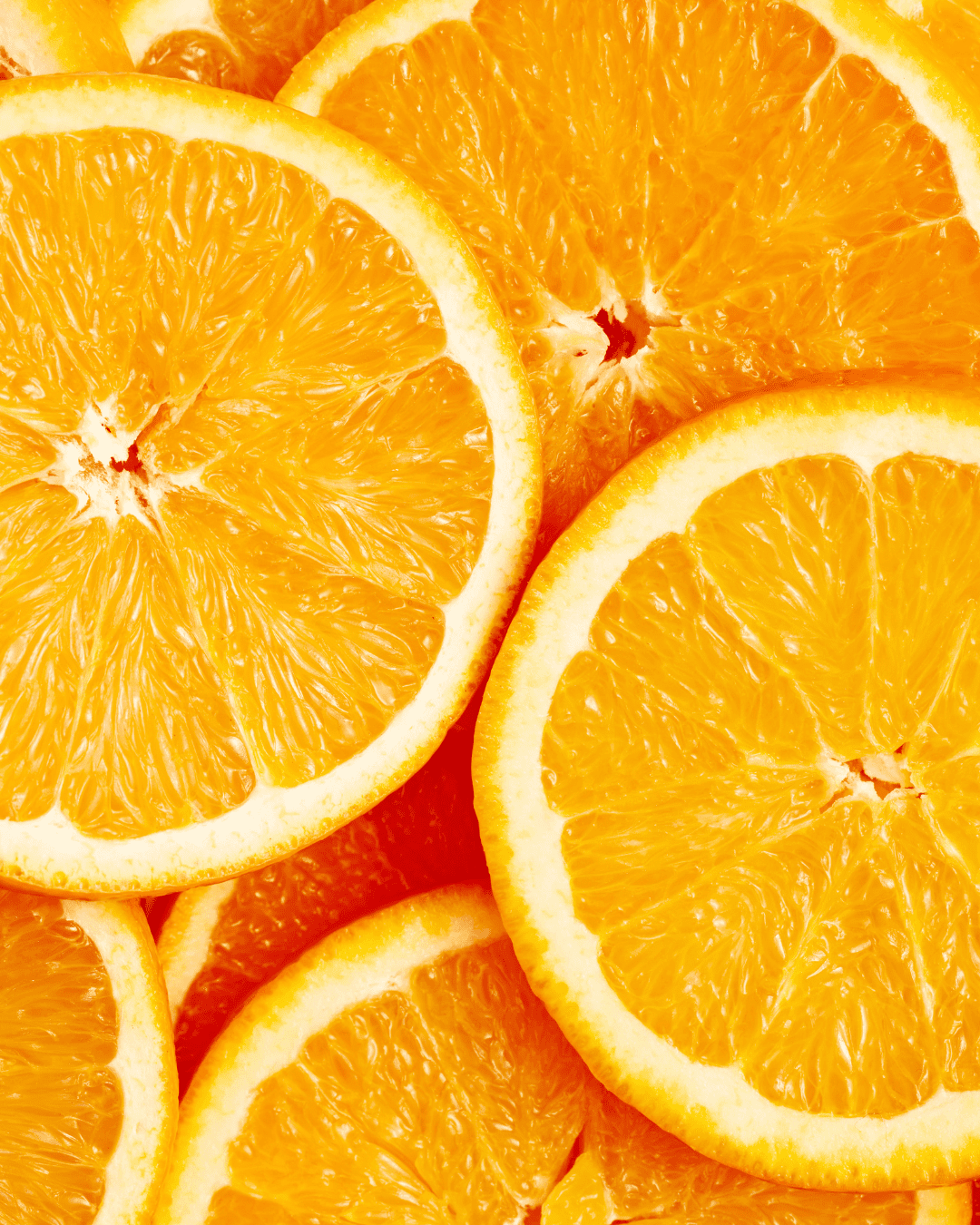 Stacked slices of fresh oranges showcasing vitamin c skincare ingredient. An ingredient that can be found in Ayurvedic skincare.