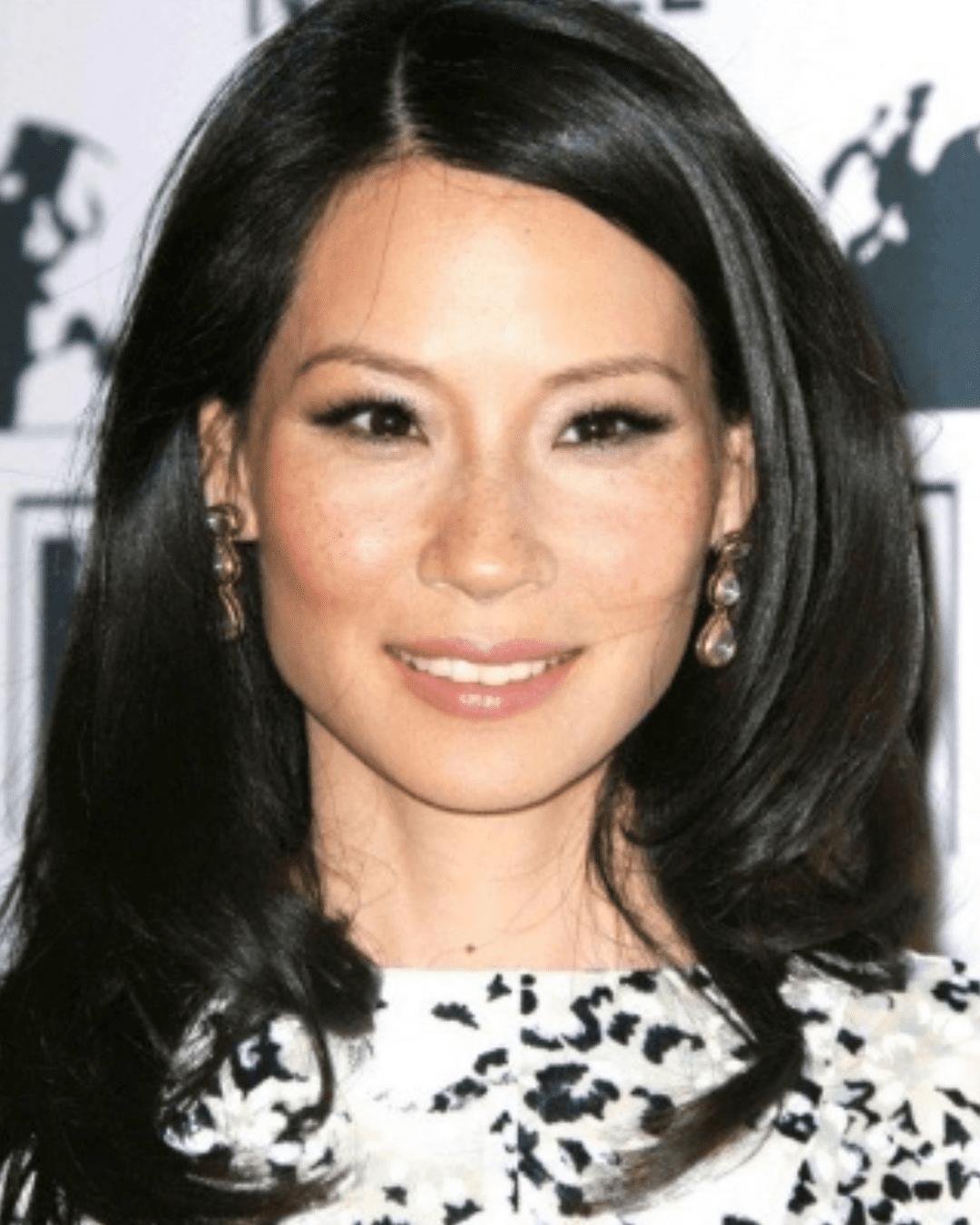 Lucy Liu showing her real skin with freckles.