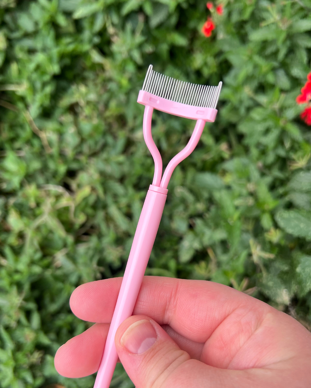 Pink mascara lash comb