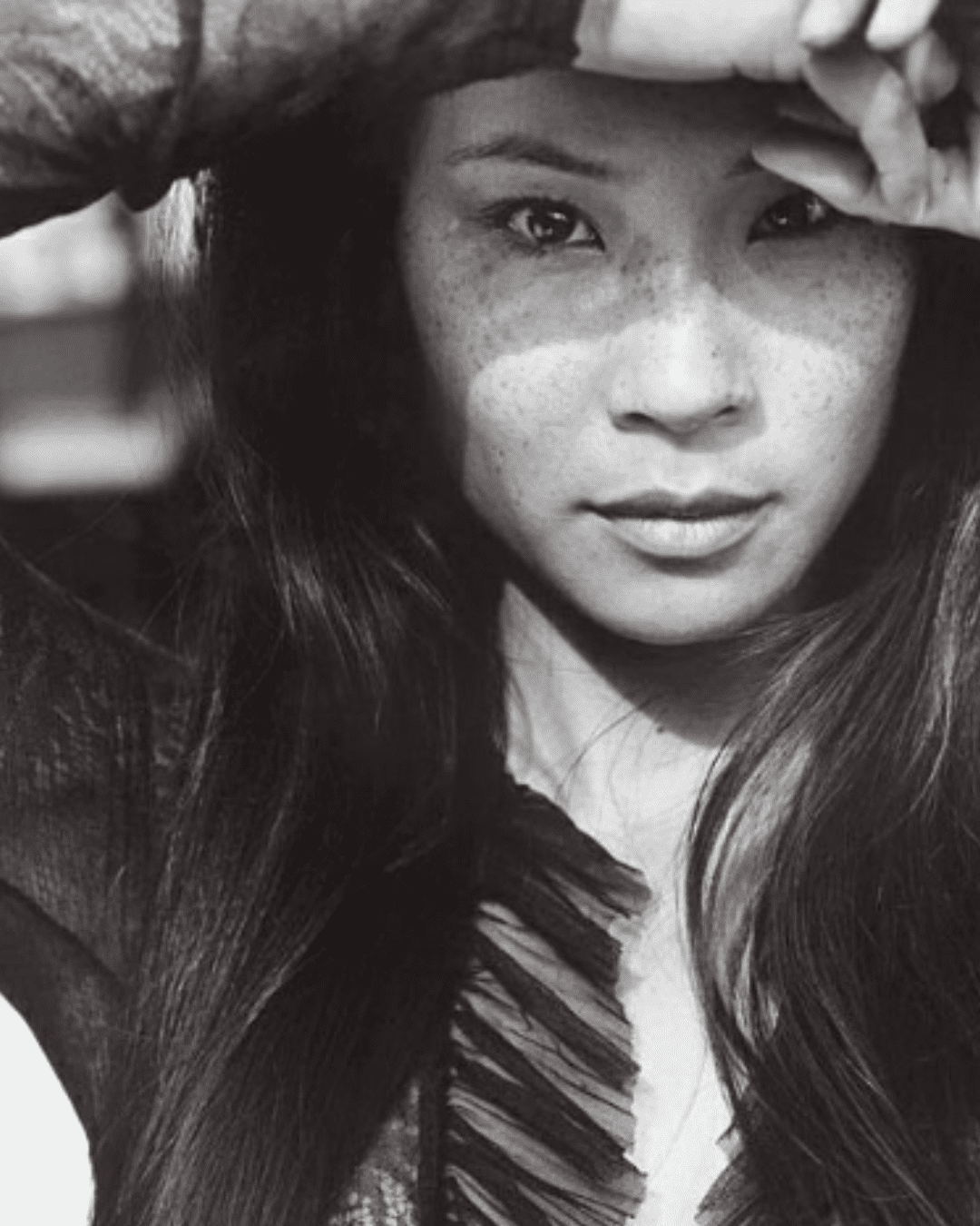 Lucy Liu showing her real skin with freckles.