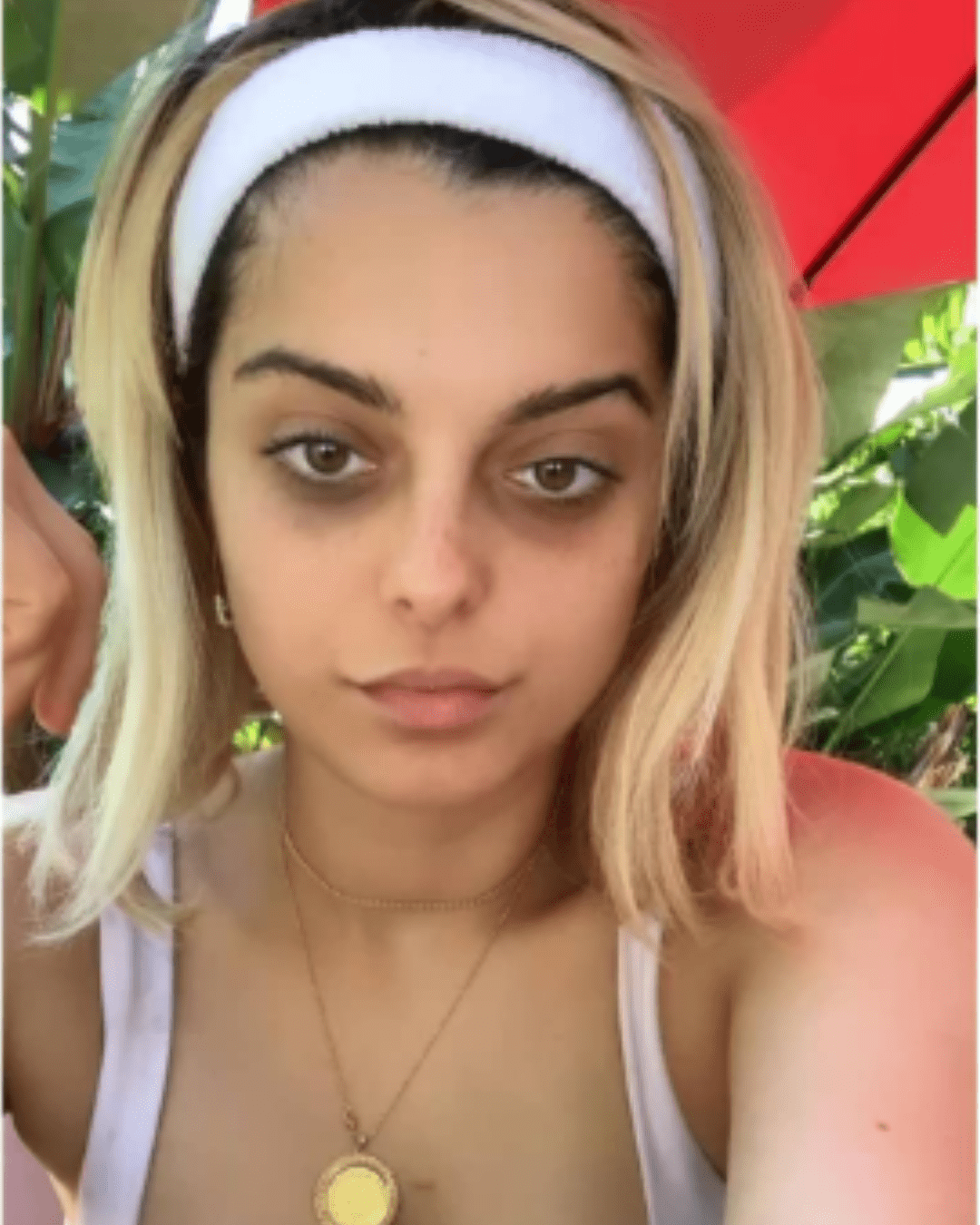 Bebe Rexha showing her dark circles under her eyes, showing her real skin.