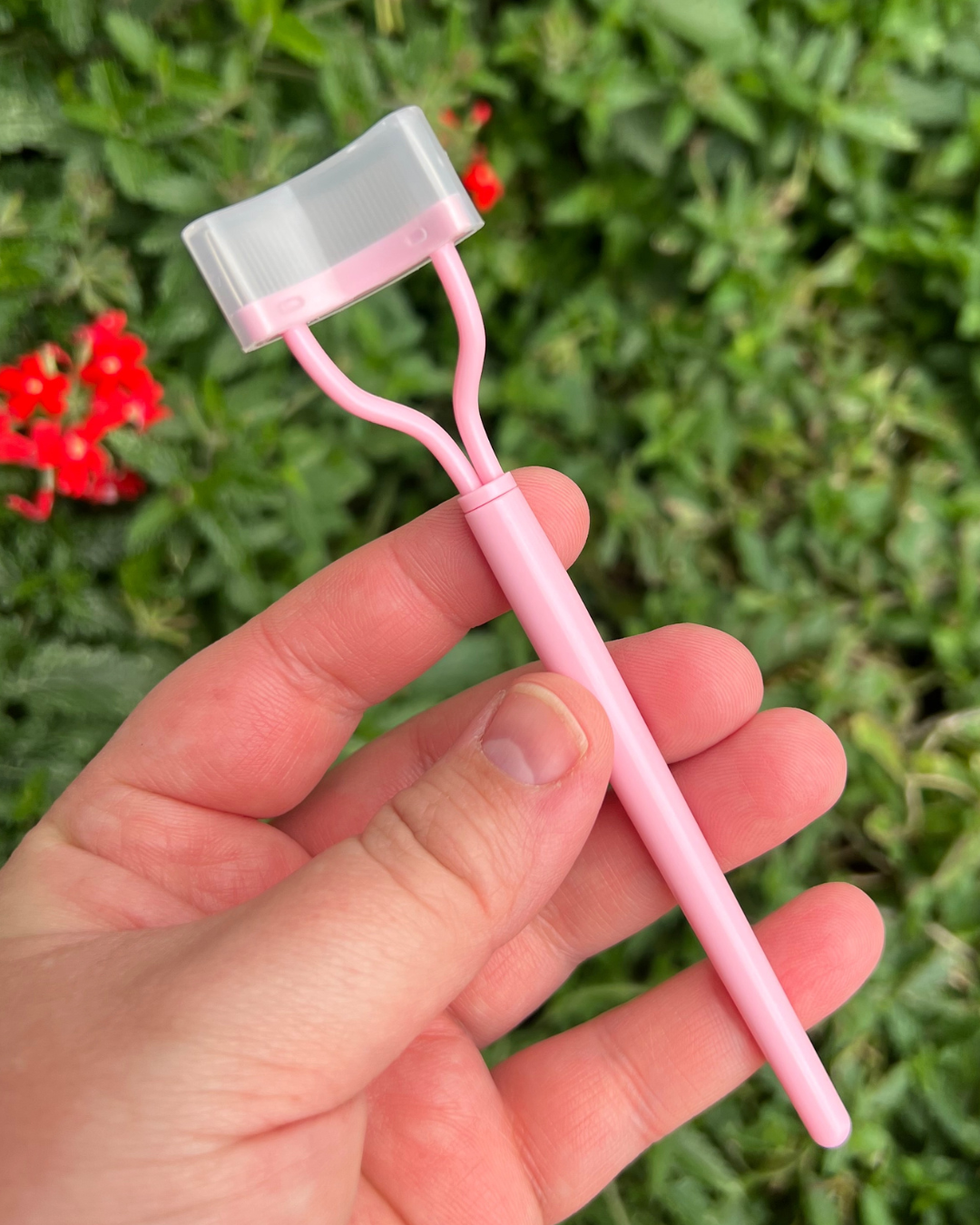 Pink mascara lash comb