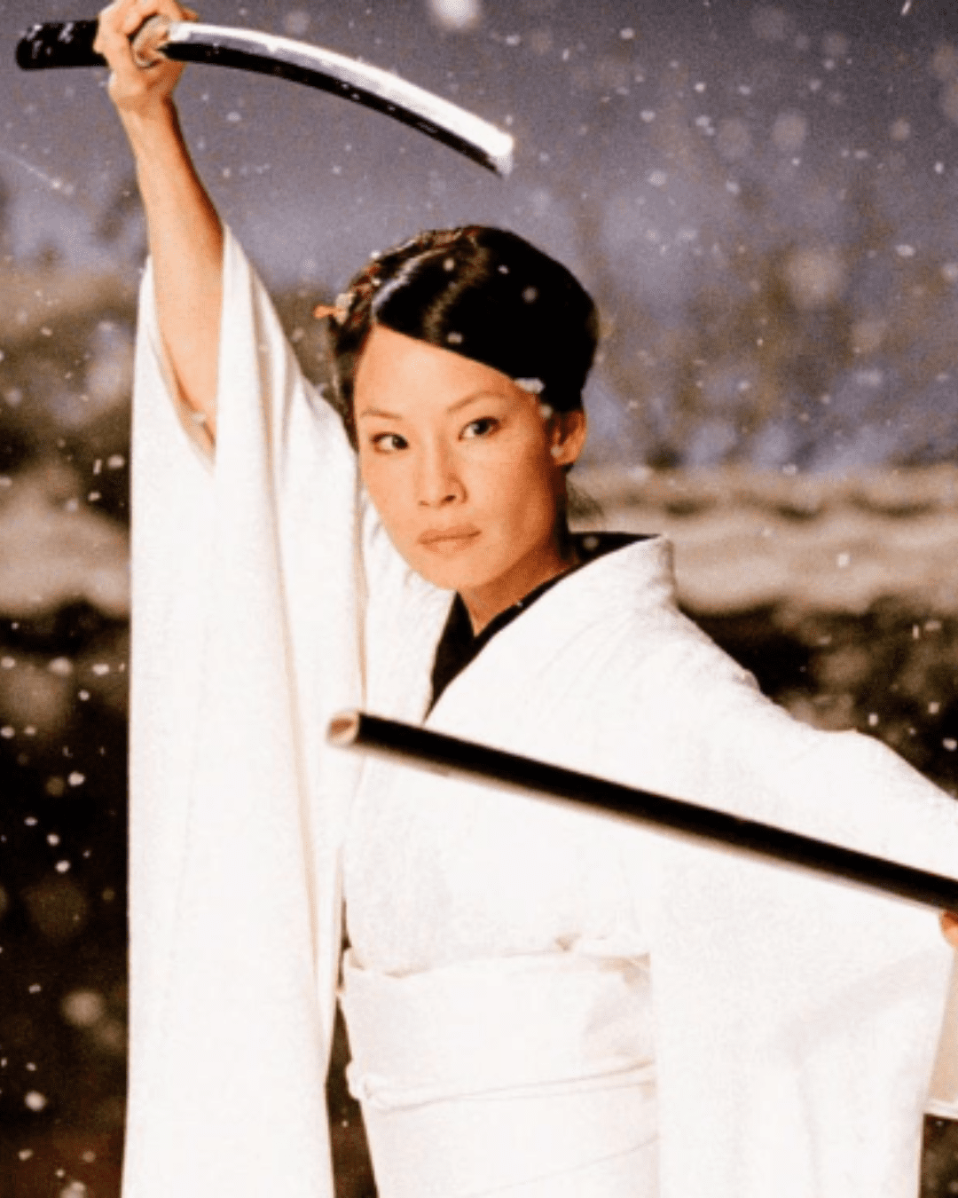 Lucy Liu showing her real skin with freckles from the movie Kill Bill.