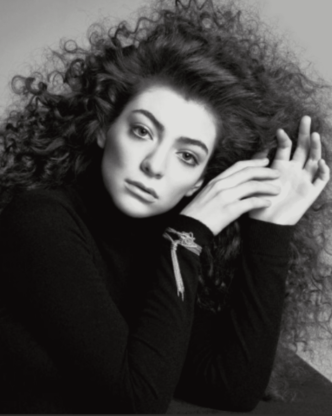 Lorde photographed and edited so that her real skin is not showing.