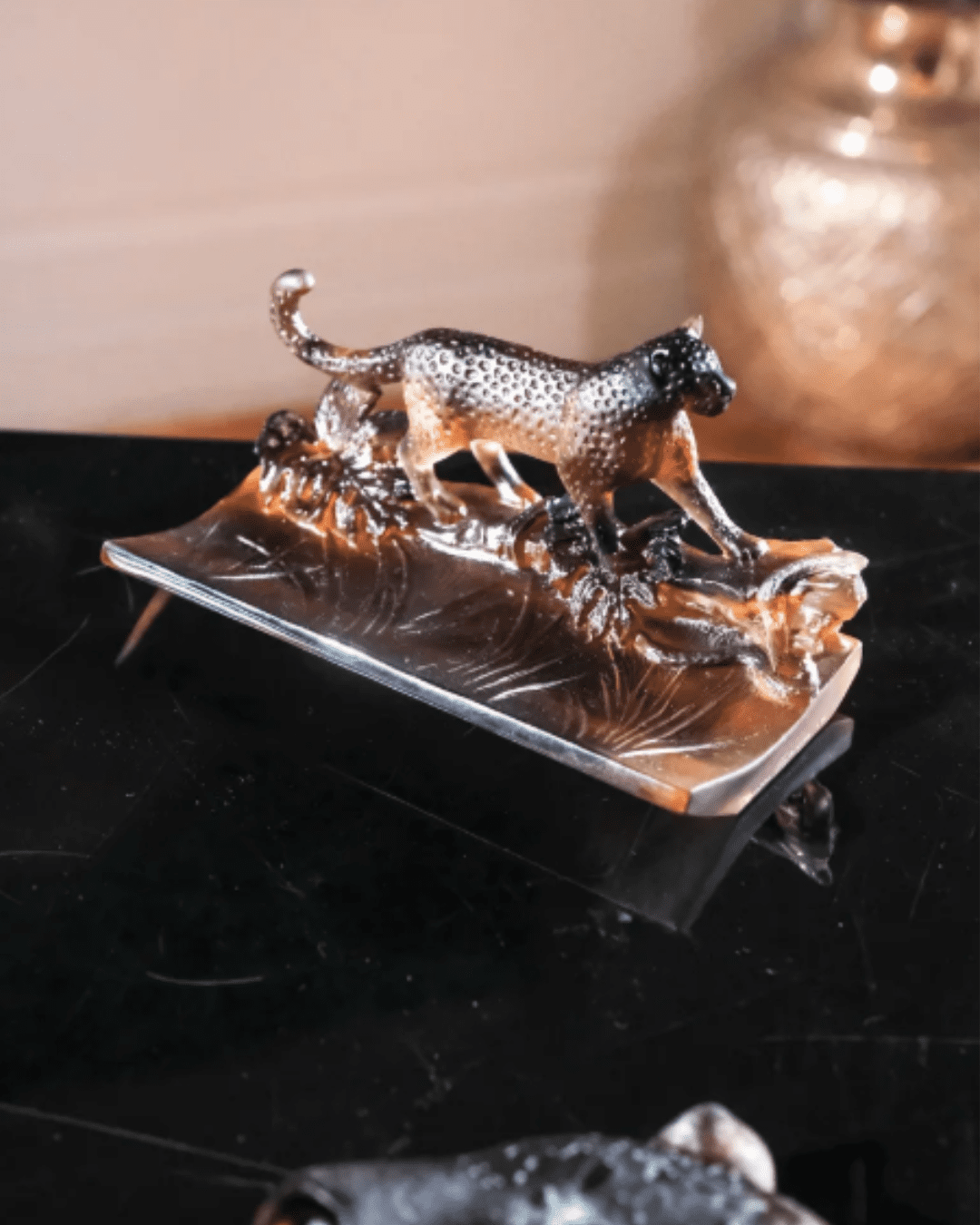 Side angle of Daum Leopard Pen Holder highlighting detailed glass sculpture and pen slot design.