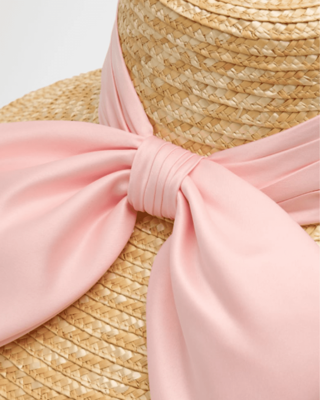 Close-up of Eugenia Kim Mirabel Bow Straw Hat showing the bow detail at the back, stylish sun protective design.