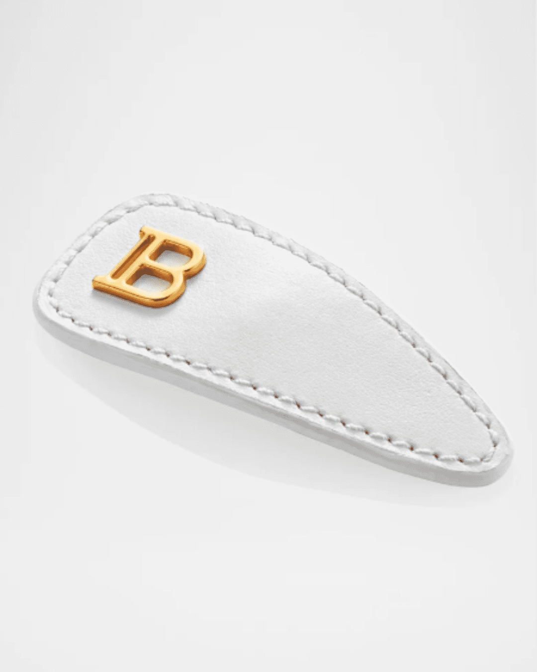 Balmain Hair Limited Edition Printemps Leather Snap Hair Clip, tan leather with gold hardware, stylish hair accessory.