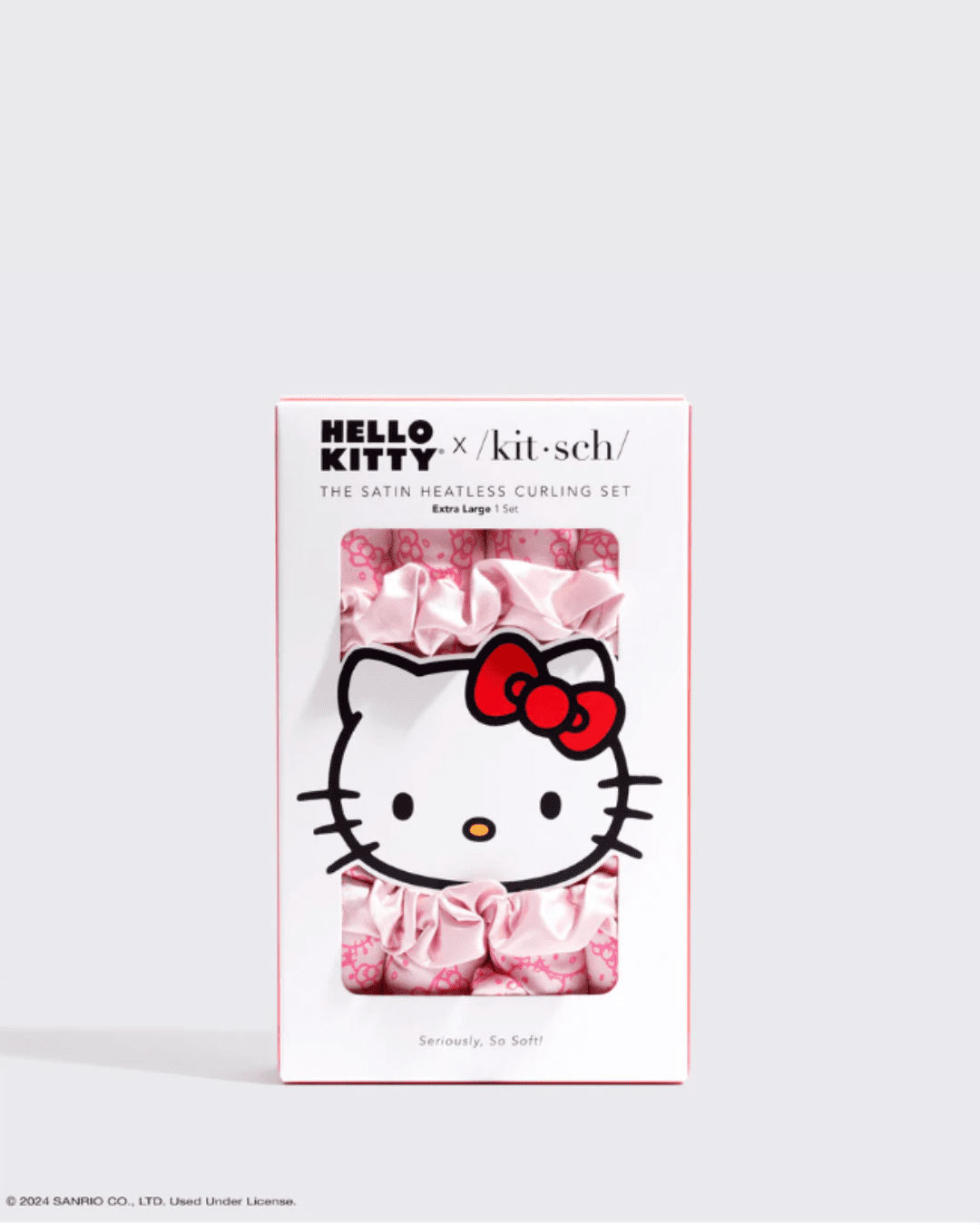 Kitsch Hello Kitty Heatless Curling Set packaging on a light gray background, showing the curlers inside and Hello Kitty in the center.
