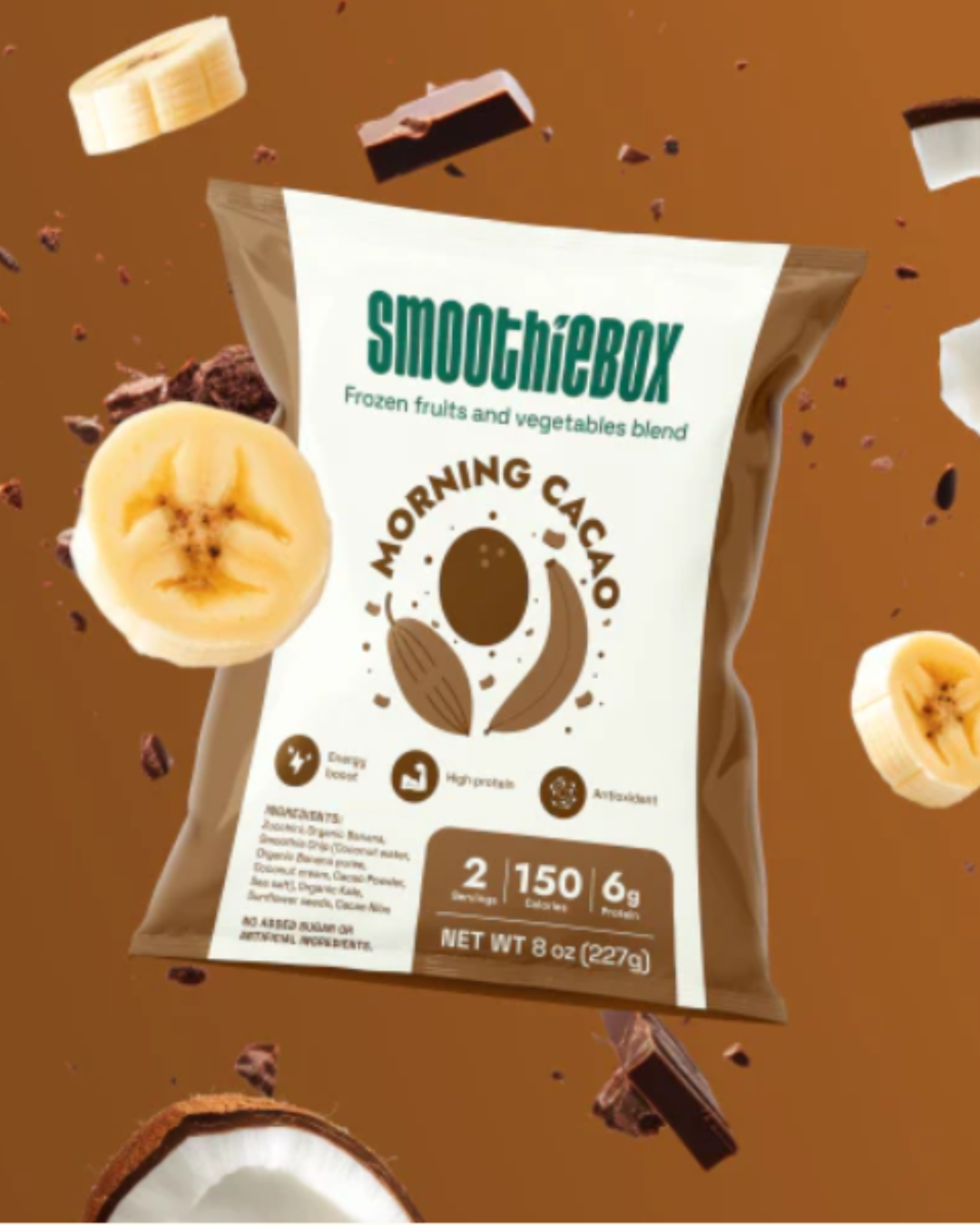 SmoothieBox Morning Cocoa blend pouch with coconut, banana, cocoa pieces surrounding the bag. The packaging highlights energy boost, high protein, and antioxidants with nutritional details on a white and cocoa-colored design. Drink this as a self-love practice.