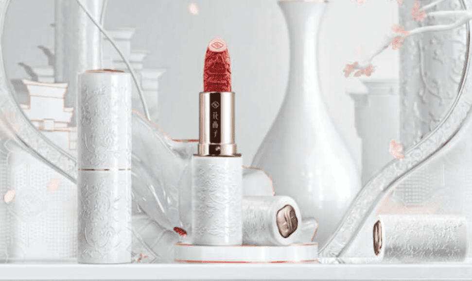 Florasis Lipstick Blooming Rouge Porcelain Lipstick with several other porcelain packaged lipsticks on a white background, featured image for the Florasis Lipstick Review blog post