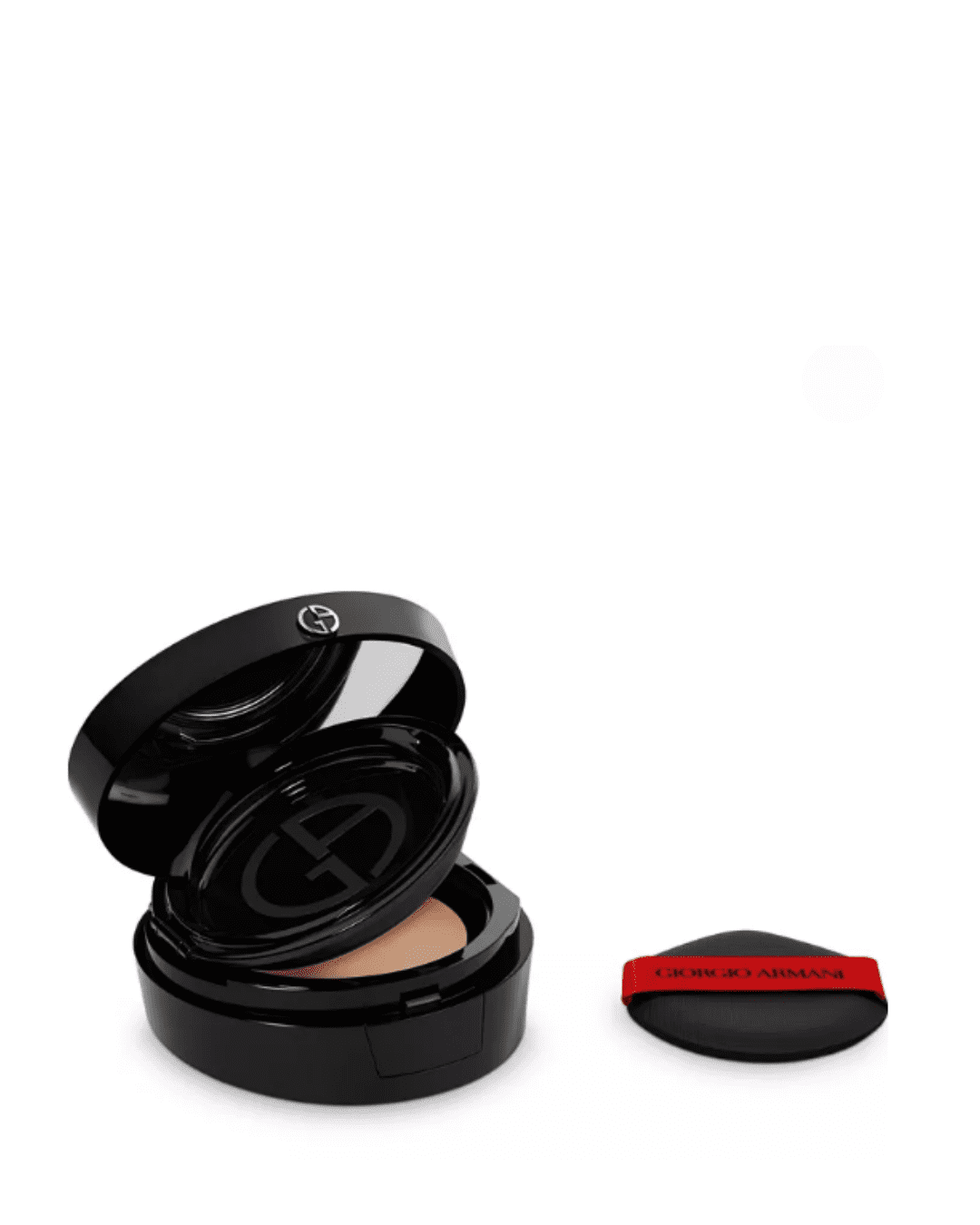 Giorgio Armani Power Fabric Foundation Compact open on white surface, powder puff beside it, showing the foundation inside.
