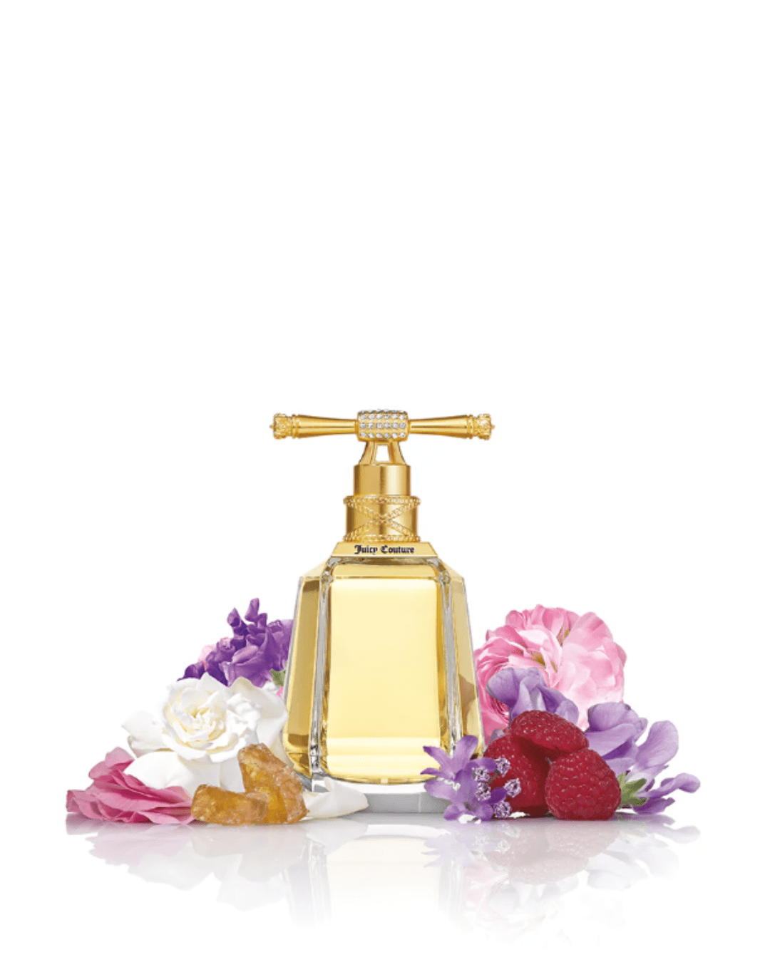I Am Juicy Couture Eau de Parfum Spray on a white background with white, purple and pink flowers surrounding the perfume bottle. Juicy Couture Fruity Perfumes.