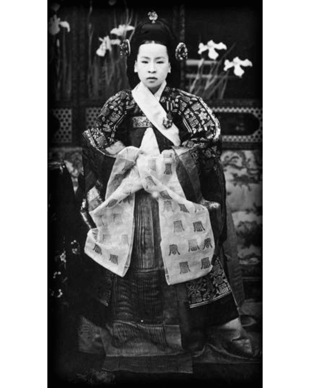 Historic black-and-white portrait of Empress Sungeonghyo, dressed in traditional royal Korean attire.