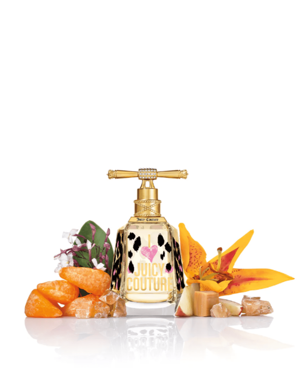 I Love Juicy Couture Eau de Parfum Spray is a gold perfume bottle with black leopard spots and a pink heart on the bottle surrounded by fruits and flowers found in the scent. Juicy Couture Fruity Perfumes.