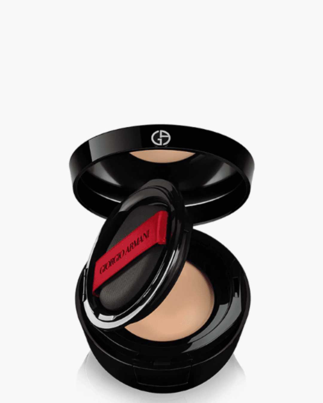 Giorgio Armani Power Fabric Compact Cream Foundation Balm open on white surface with powder puff visible.