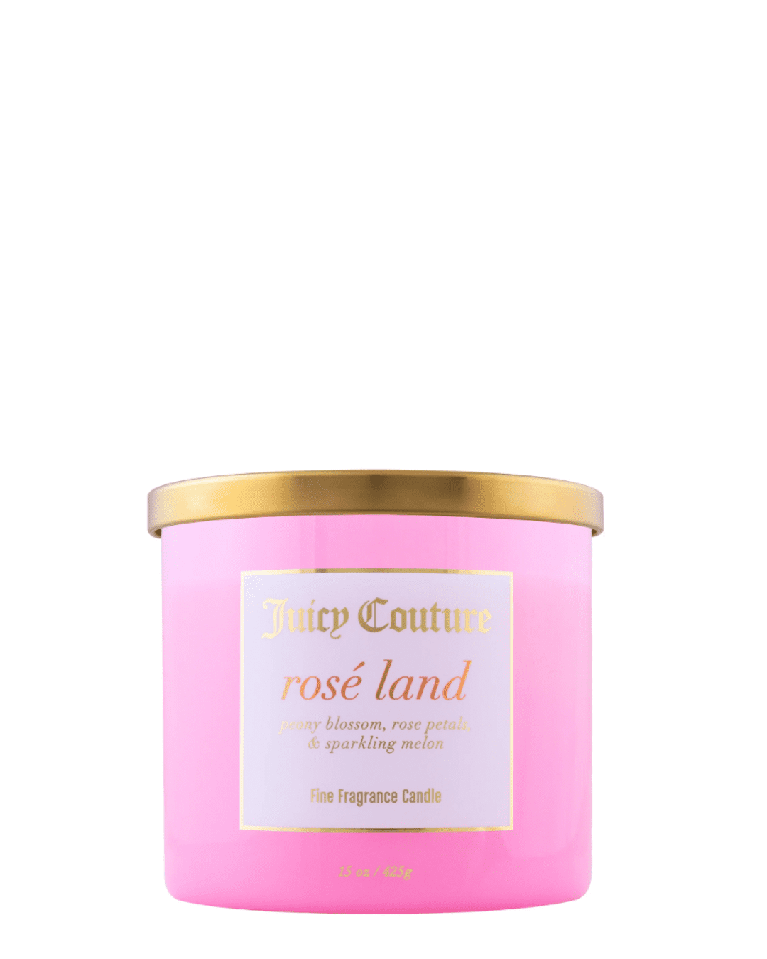 Juicy Couture Rose' Land candle in light pink glass with a gold lid and gold lettering, labeled with notes of peony blossom, rose petals, and sparkling melon.