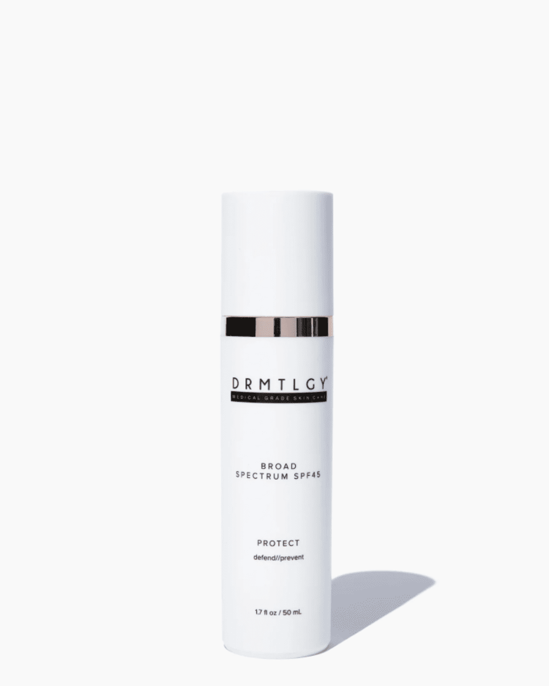 DRMTLGY Broad Spectrum SPF 45 in a white bottle on a flat white surface with soft shadows and a white background, showing the product packaging and "protect" branding.