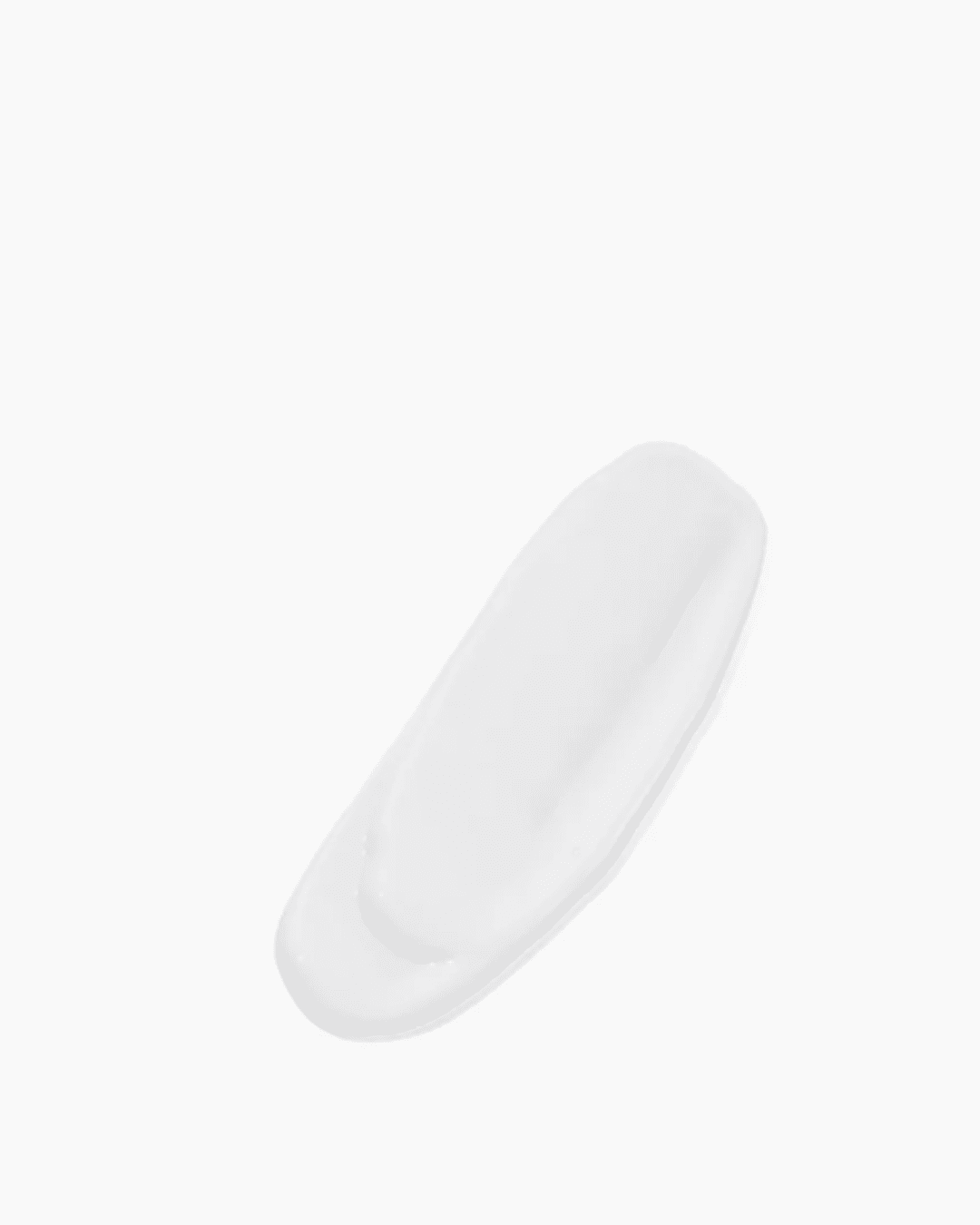 Swatch of DRMTLGY Broad Spectrum SPF 45 sunscreen on a white background, showing the texture and creamy consistency of the product.