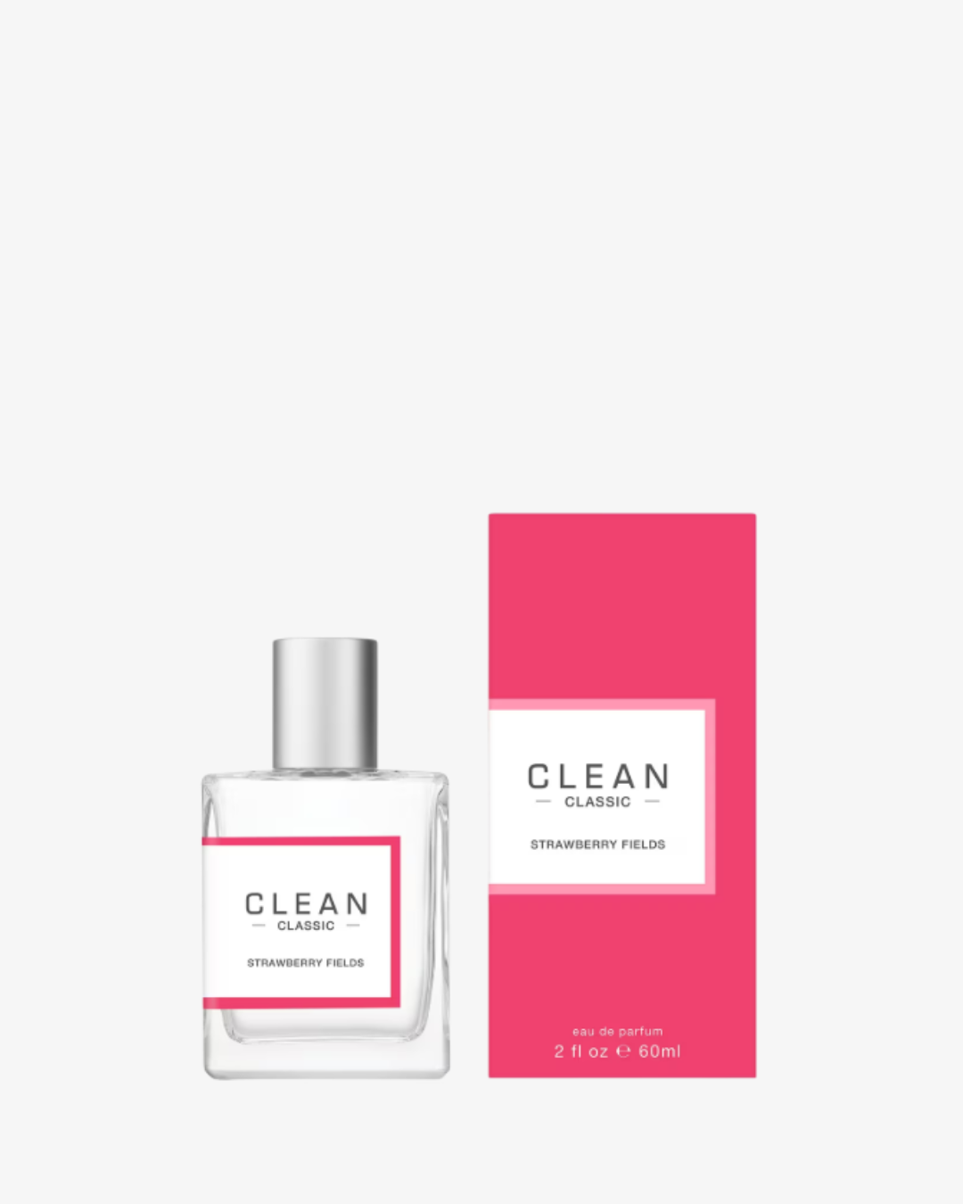 Clean Classic Strawberry Fields Eau de Parfum bottle displayed with its pink box packaging against a white background, highlighting this elegant strawberry perfume among strawberry perfumes.