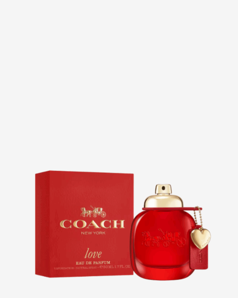 Coach Love Eau de Parfum bottle placed beside its red Coach Love box packaging, packaging on the left side, featuring a classic strawberry perfume in the strawberry perfumes collection.