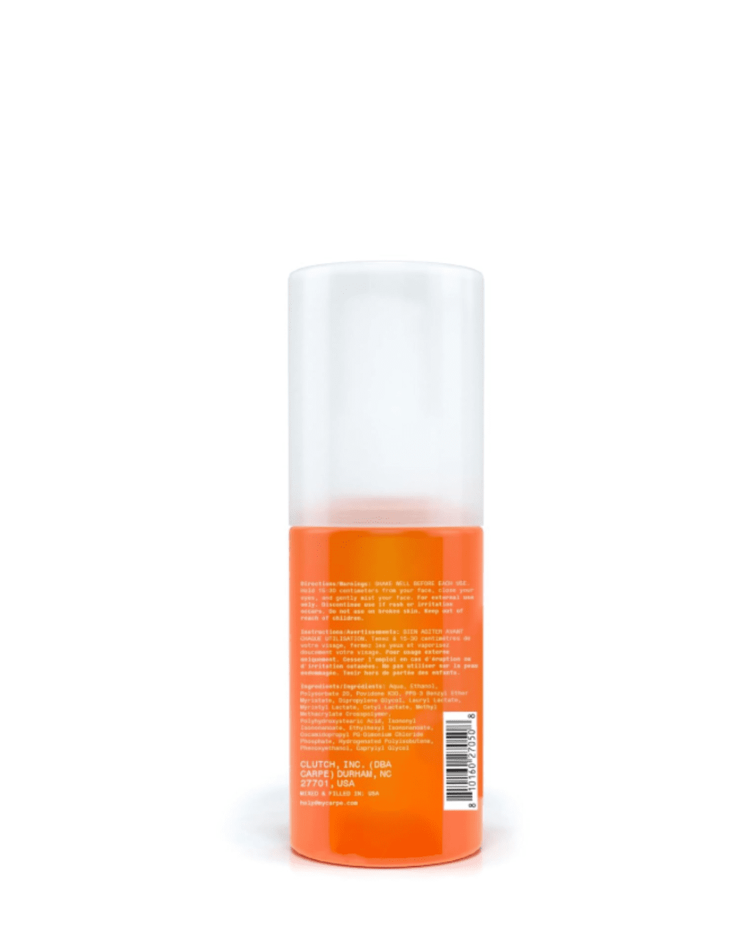 Carpe Instant Matte Setting Mist facing back on a white surface with white background, showing packaging details and instructions.
