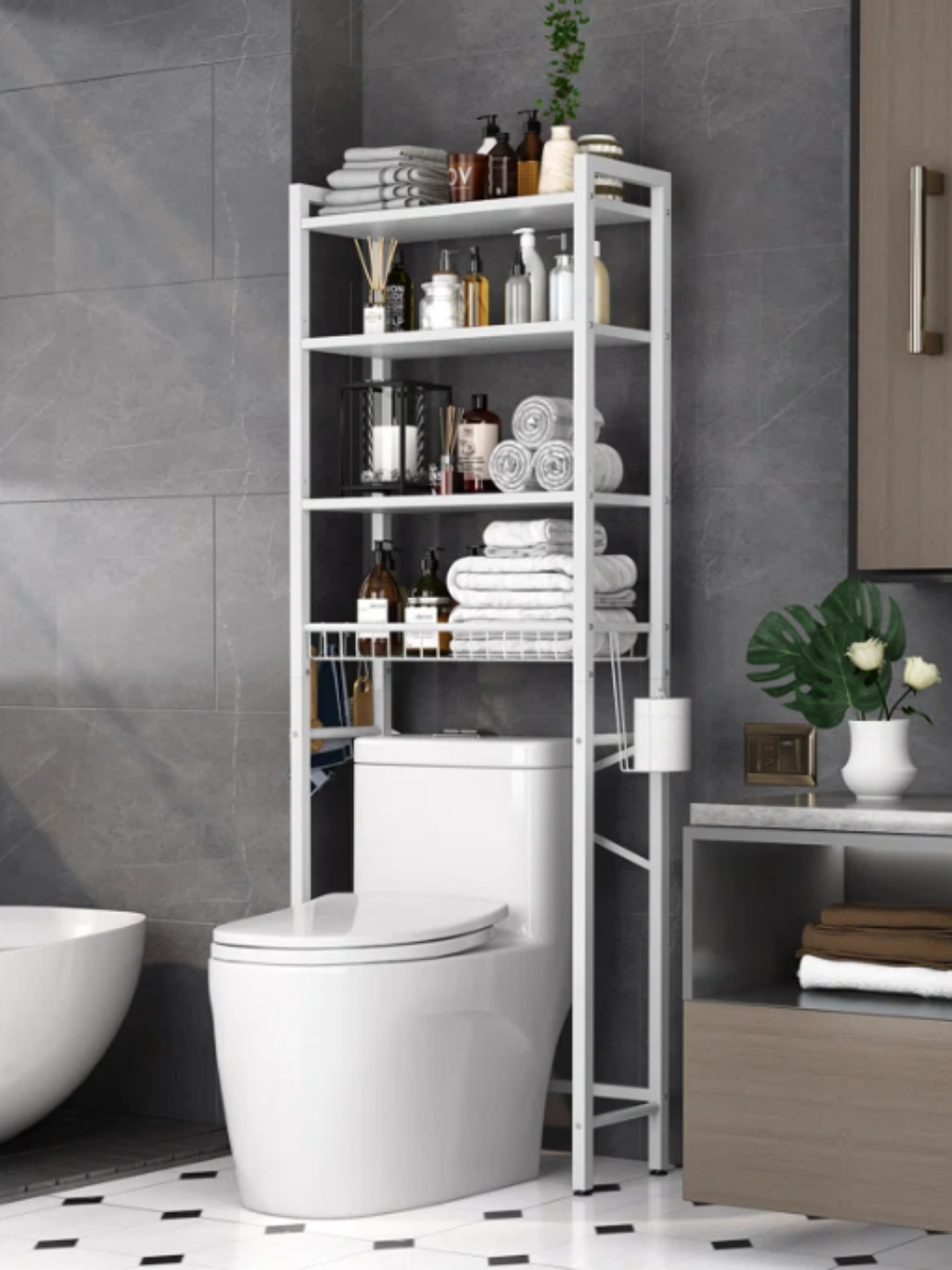 A white shelf organizer that goes over the toilet.