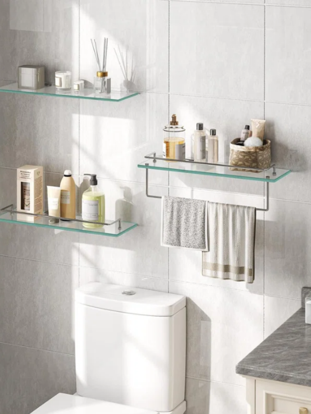 3 glass shelves with an option to hang hand towels.