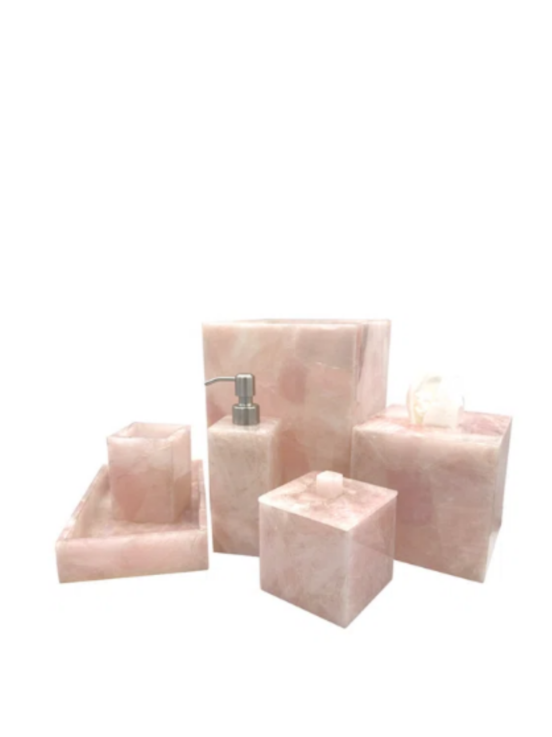 A pink natural stone bathroom accessory set.