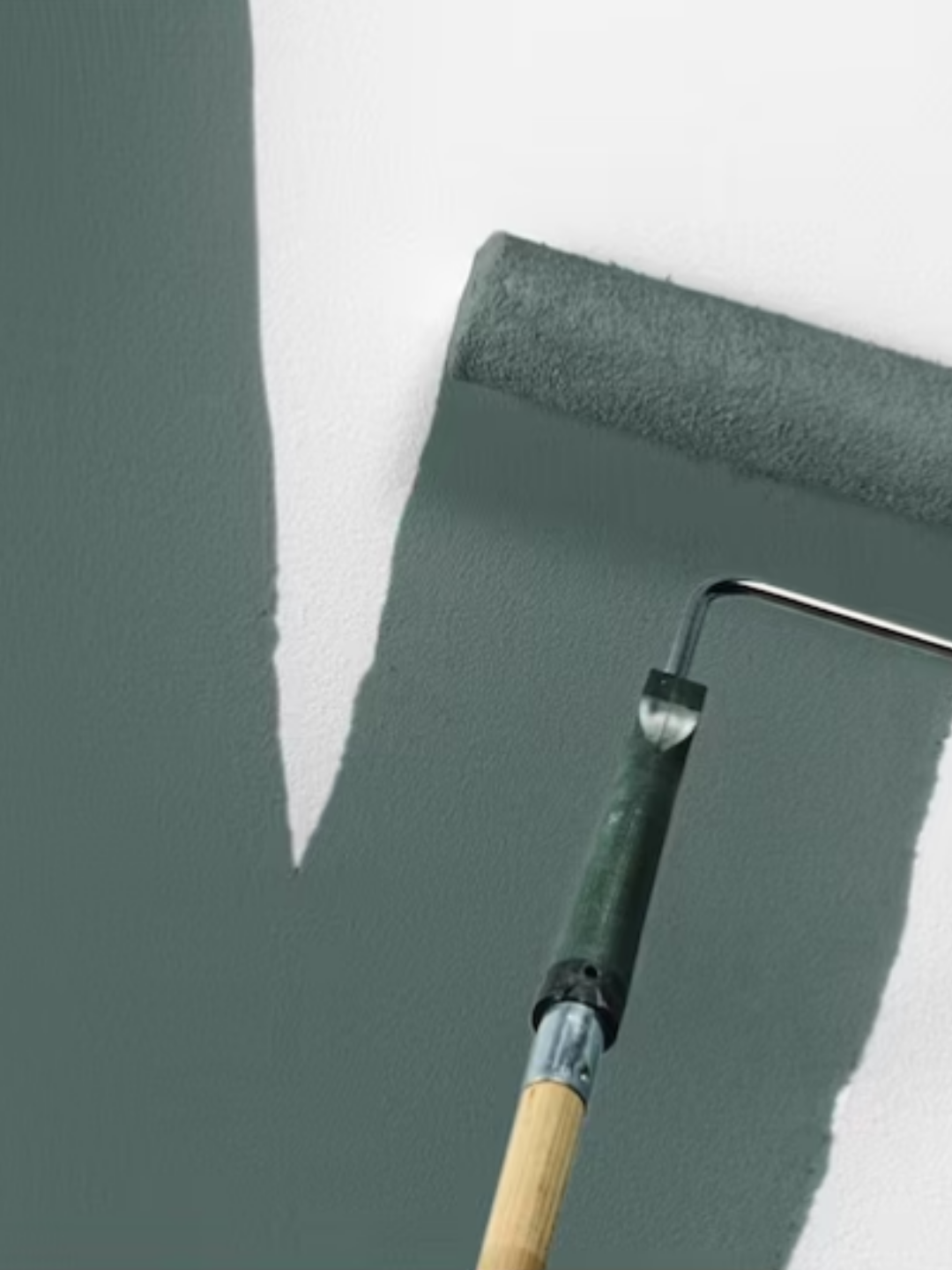 Hidden Gem paint swatch using a paint roller on a white wall.