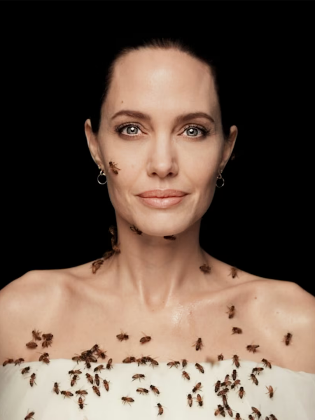 Angelina Jolie for National Geographic covered and photographed with live bees.