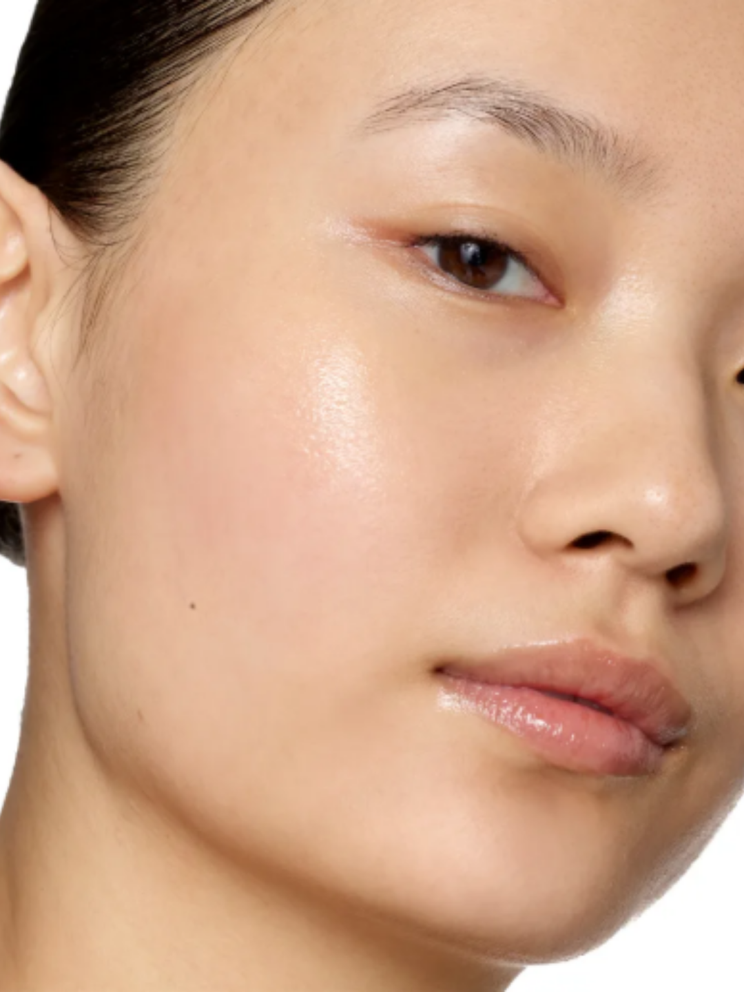 111SKIN 3 Phase Anti Blemish Booster on an Asian woman's face. This product contains Salicylic Acid.